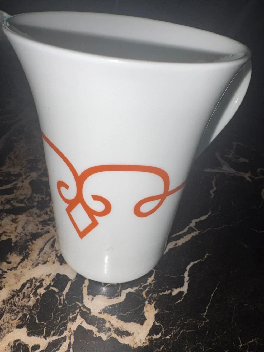 Starbucks White Ceramic Pitcher with Orange Scroll Motif